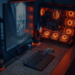 Gaming PC tower with orange RGB fans next to a monitor and mechanical keyboard on a desk