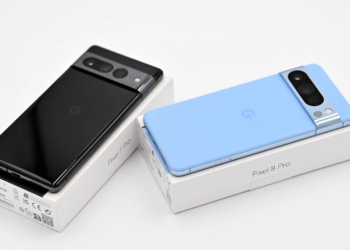 Pixel 7 Pro and Pixel 8 Pro smartphones resting on their retail boxes