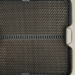 Close-up of an empty AM5 motherboard CPU socket with metal contact pins and retention arms
