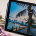 Surface tablet on a table showing a Windows Hello lock screen, beside dried flowers and candy