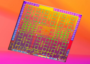 Colorful abstract die-shot photo of an unidentified microchip on an orange-to-pink gradient background