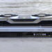 Two GeForce RTX graphics cards stacked on top of each other, seen from the side