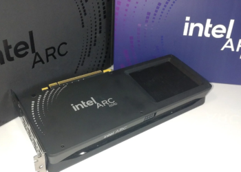 Intel Arc B580 graphics card resting against its retail packaging boxes