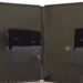 White folding smartphone open flat with two dark reflective screens joined by a hinge