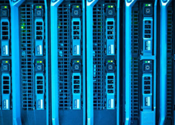 Rows of blue-lit server hard drive caddies in a data center rack