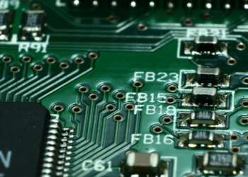 Close-up of a green circuit board showing ferrite bead labels FB15, FB16, FB18, FB23 and surface-mount components