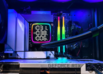 Close-up inside a PC case showing a GeForce RTX card, AIO cooler, RGB fans and RAM under blue lighting